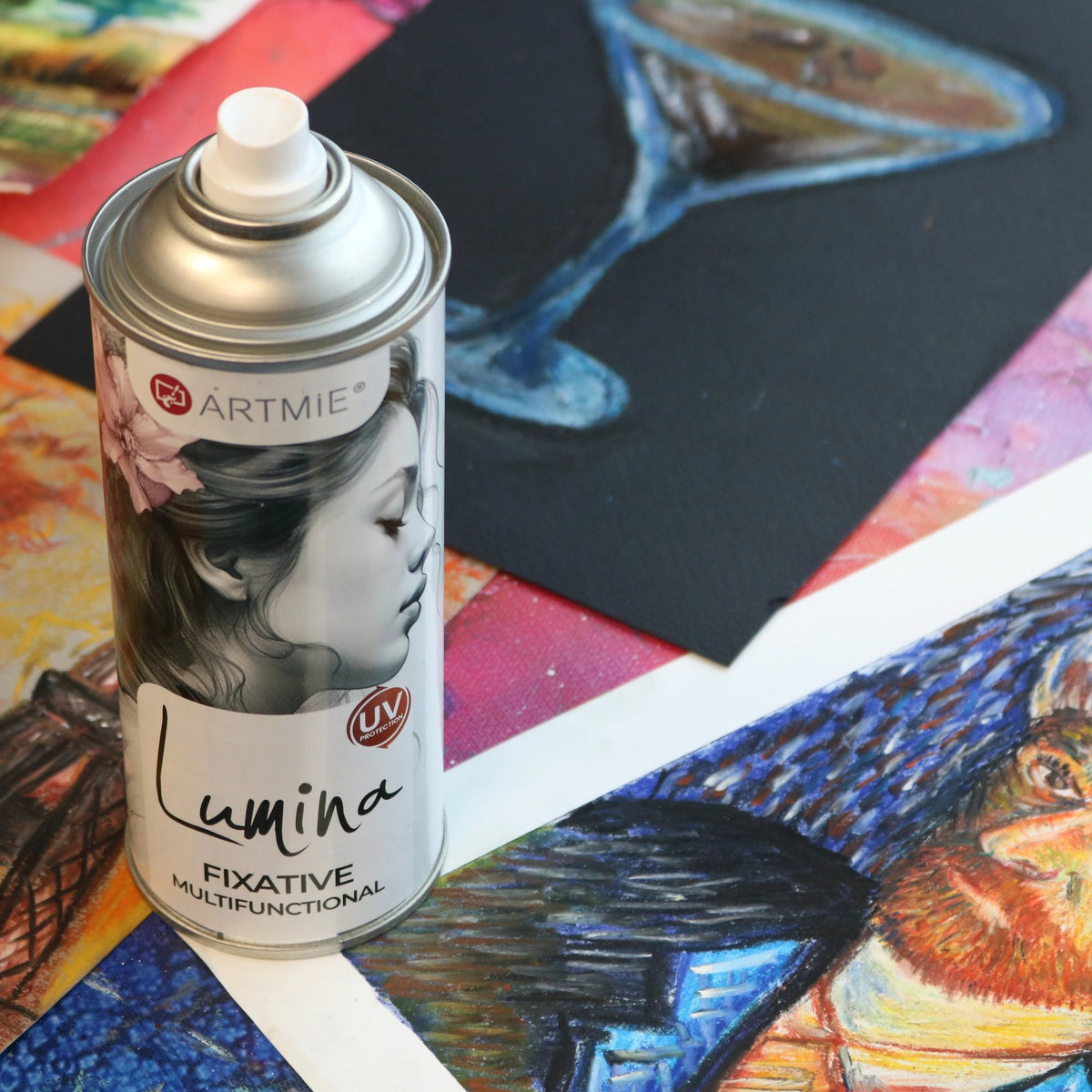 Spray fissativo ARTMIE Lumina su disegni colorati a pastello